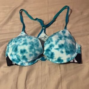 Well loved VS PINK green tie dye front clip bra.